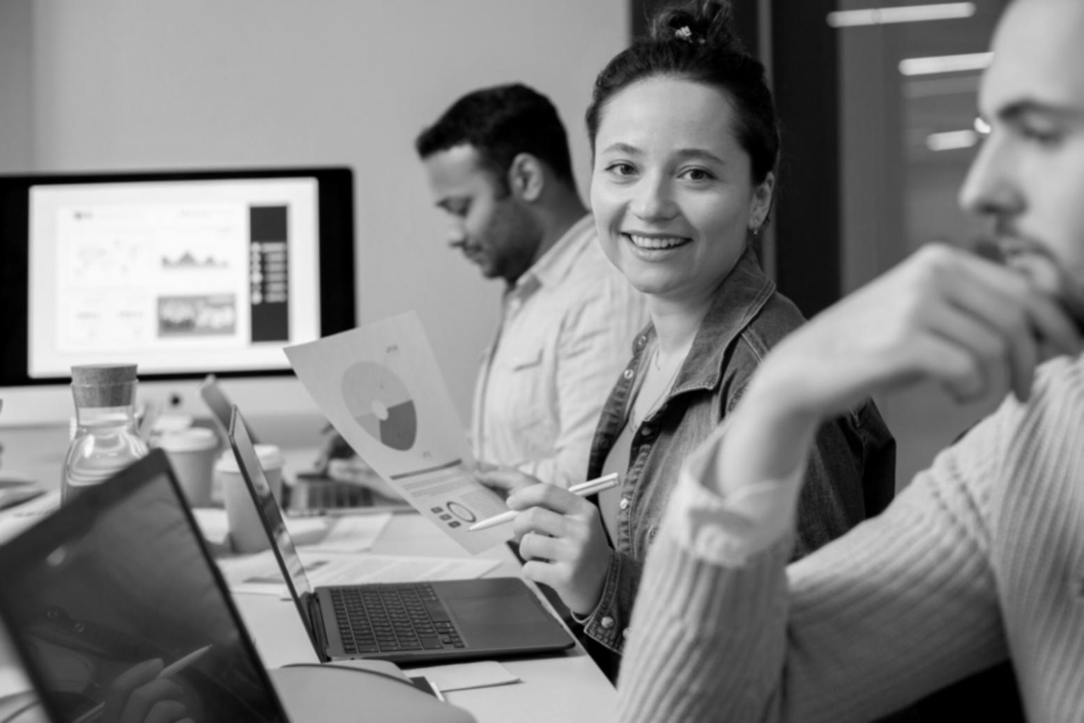 collaborative learning session with participants discussing financial strategies